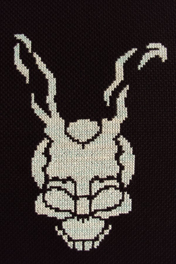 Frank is of course the skull bunny from Donnie Darko